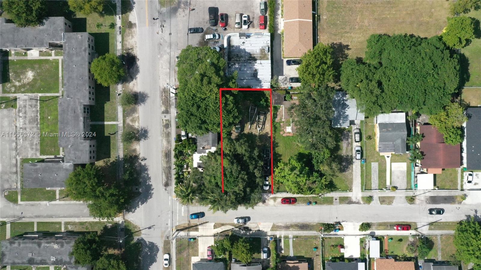 1975 Northwest 53rd Street Miami, FL 33142 - Photo 3 of 6 an aerial view of multiple house