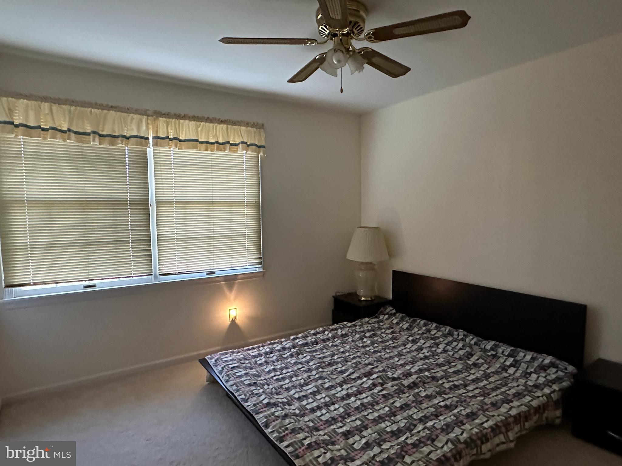 703 Lora Lane Hockessin, DE 19707 - Photo 18 of 28 a bedroom with a bed and window