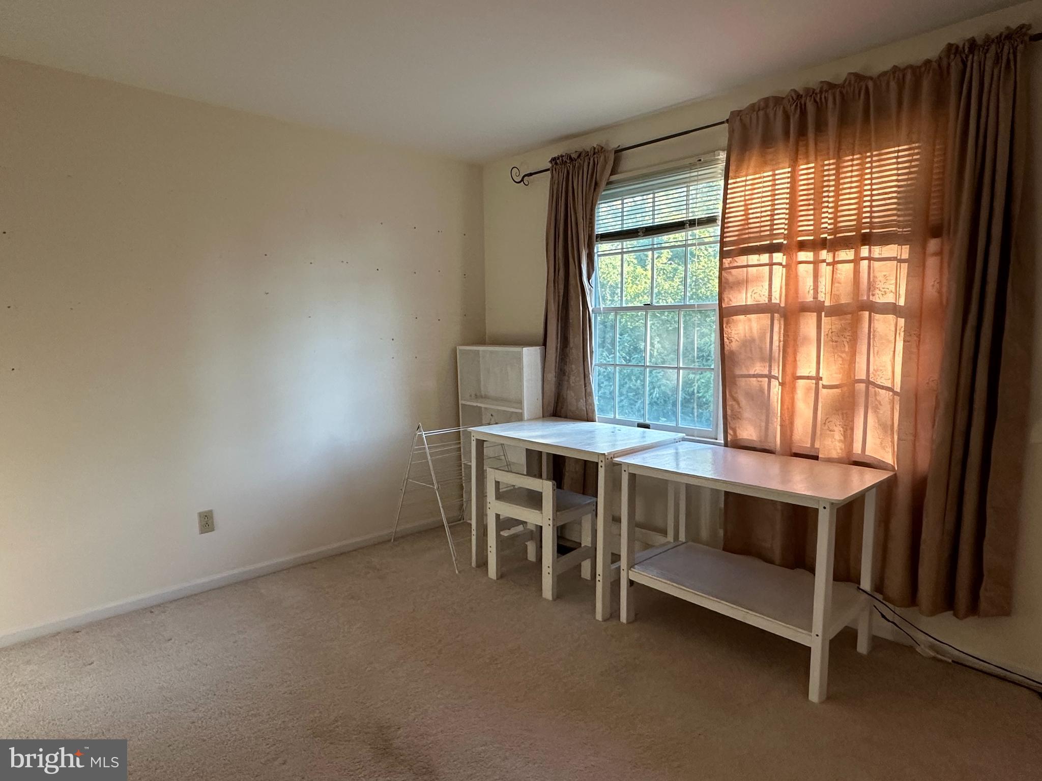 703 Lora Lane Hockessin, DE 19707 - Photo 21 of 28 a room with table chair and window
