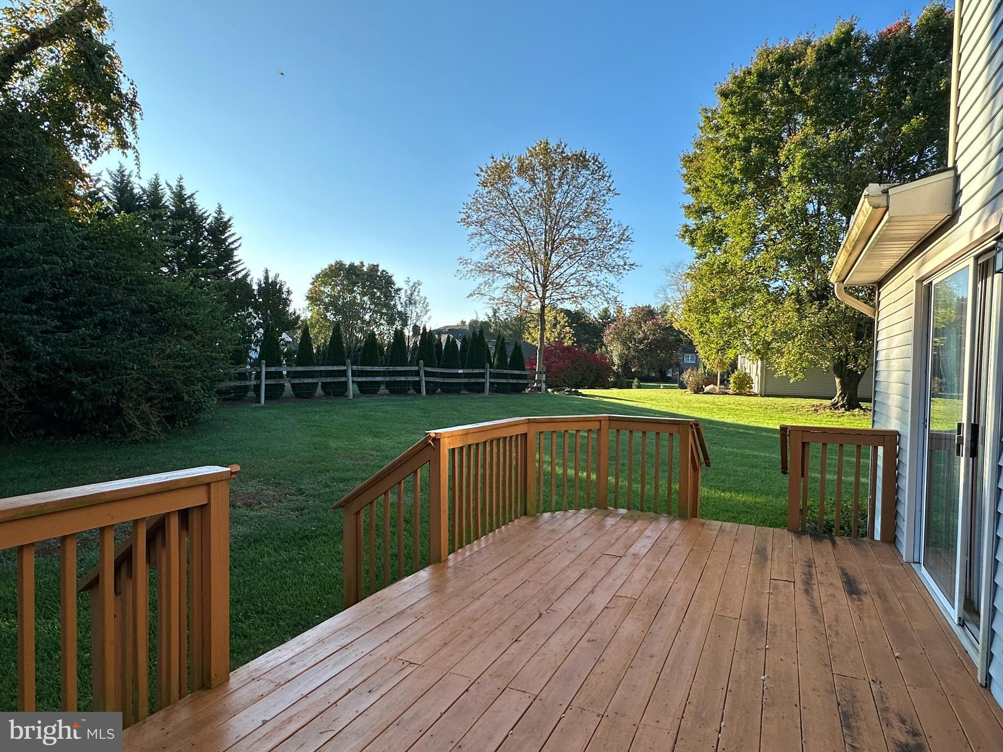 703 Lora Lane Hockessin, DE 19707 - Photo 24 of 28 a balcony with wooden floor in outdoor space