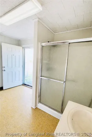 a view of a backyard and an ocean view