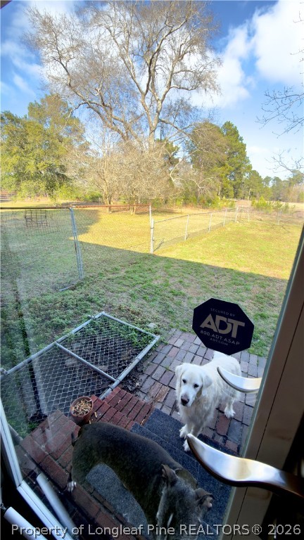 5271 Tobacco Road Orrum, NC 28369 - Photo 30 of 49 a view of a backyard and an ocean view