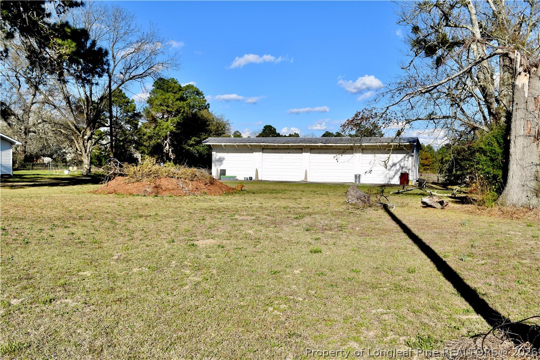 5271 Tobacco Road Orrum, NC 28369 - Photo 48 of 49 a view of swimming pool with outdoor seating