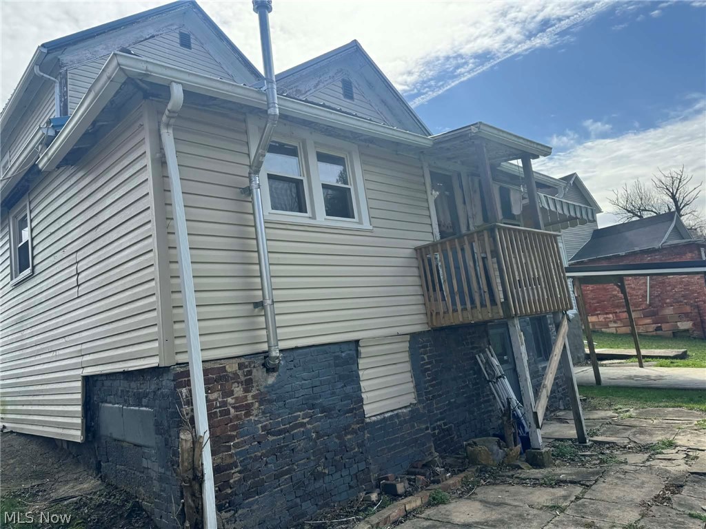 3 South 2nd Street Dennison, OH 44621 - Photo 3 of 16 View of side of home featuring a balcony