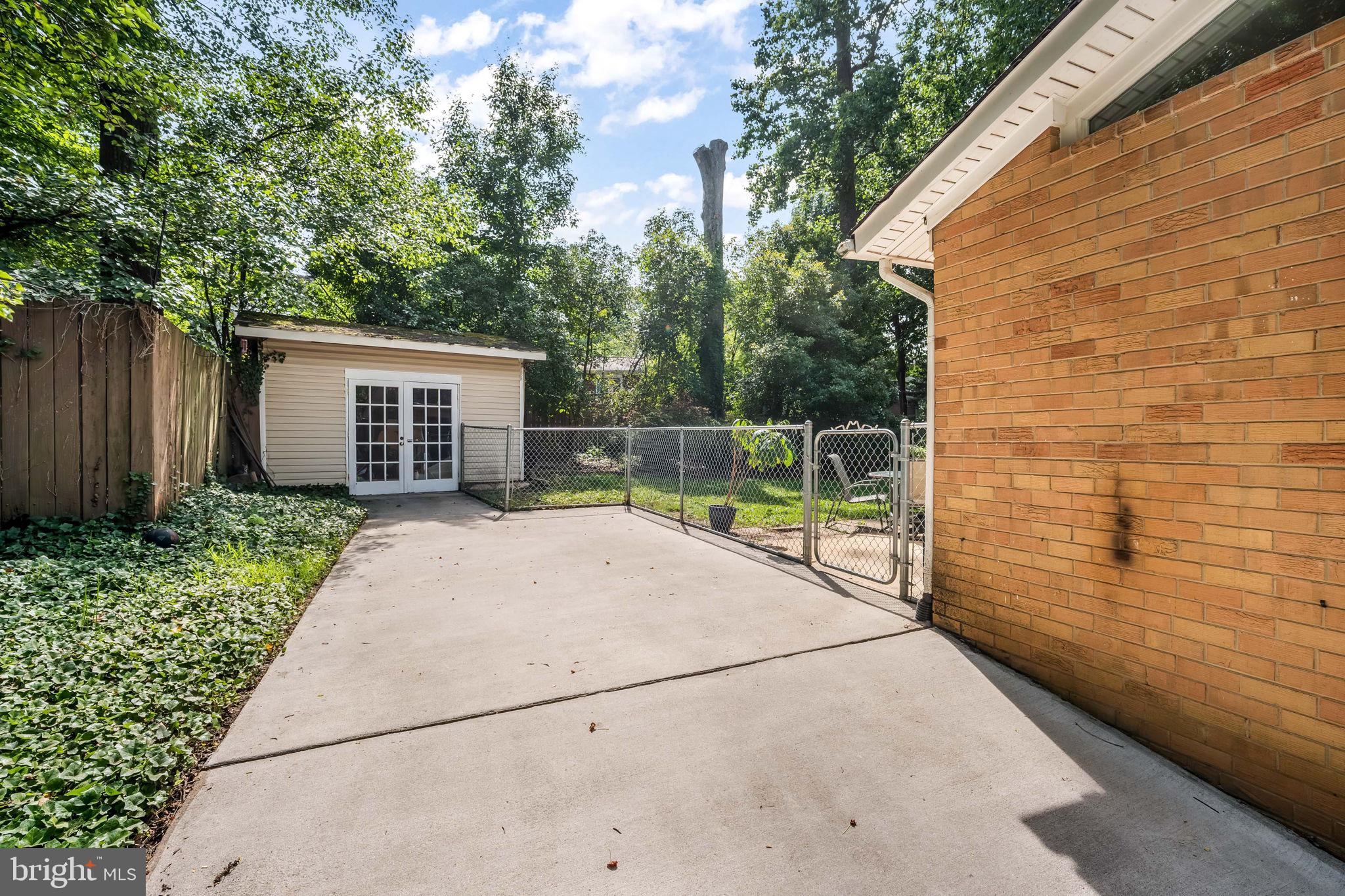 8926 Cromwell Drive Springfield, VA 22151 - Photo 36 of 43 Expansive driveway and storage sheds