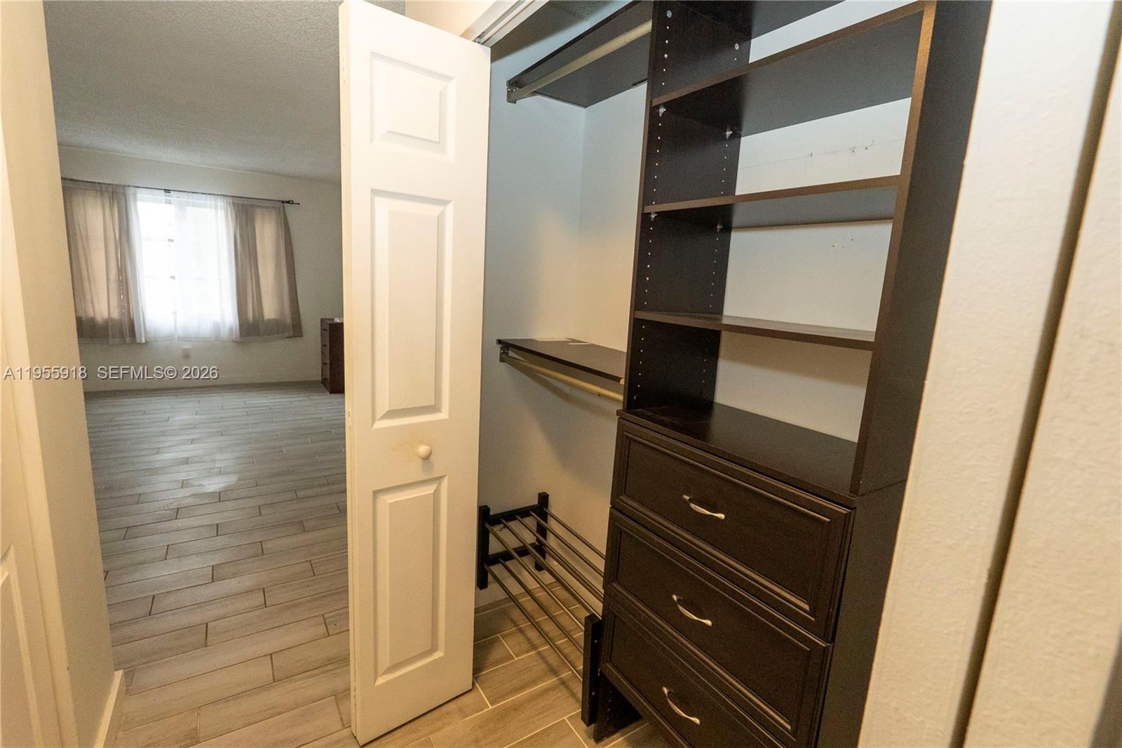 7743 Southwest 86th Street, Unit D227 Miami, FL 33143 - Photo 20 of 24 a view of walk in closet