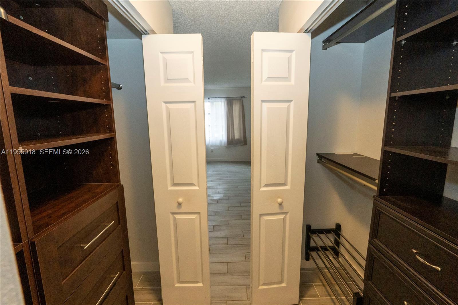7743 Southwest 86th Street, Unit D227 Miami, FL 33143 - Photo 22 of 24 a view of walk in closet