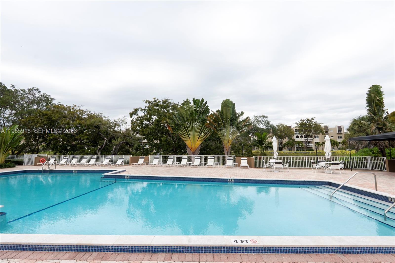 7743 Southwest 86th Street, Unit D227 Miami, FL 33143 - Photo 5 of 24 a view of a lake with houses