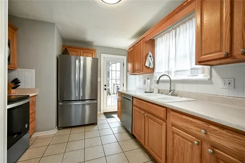 $385,000 | 417 East 69th Terrace, Kansas City, MO 64131