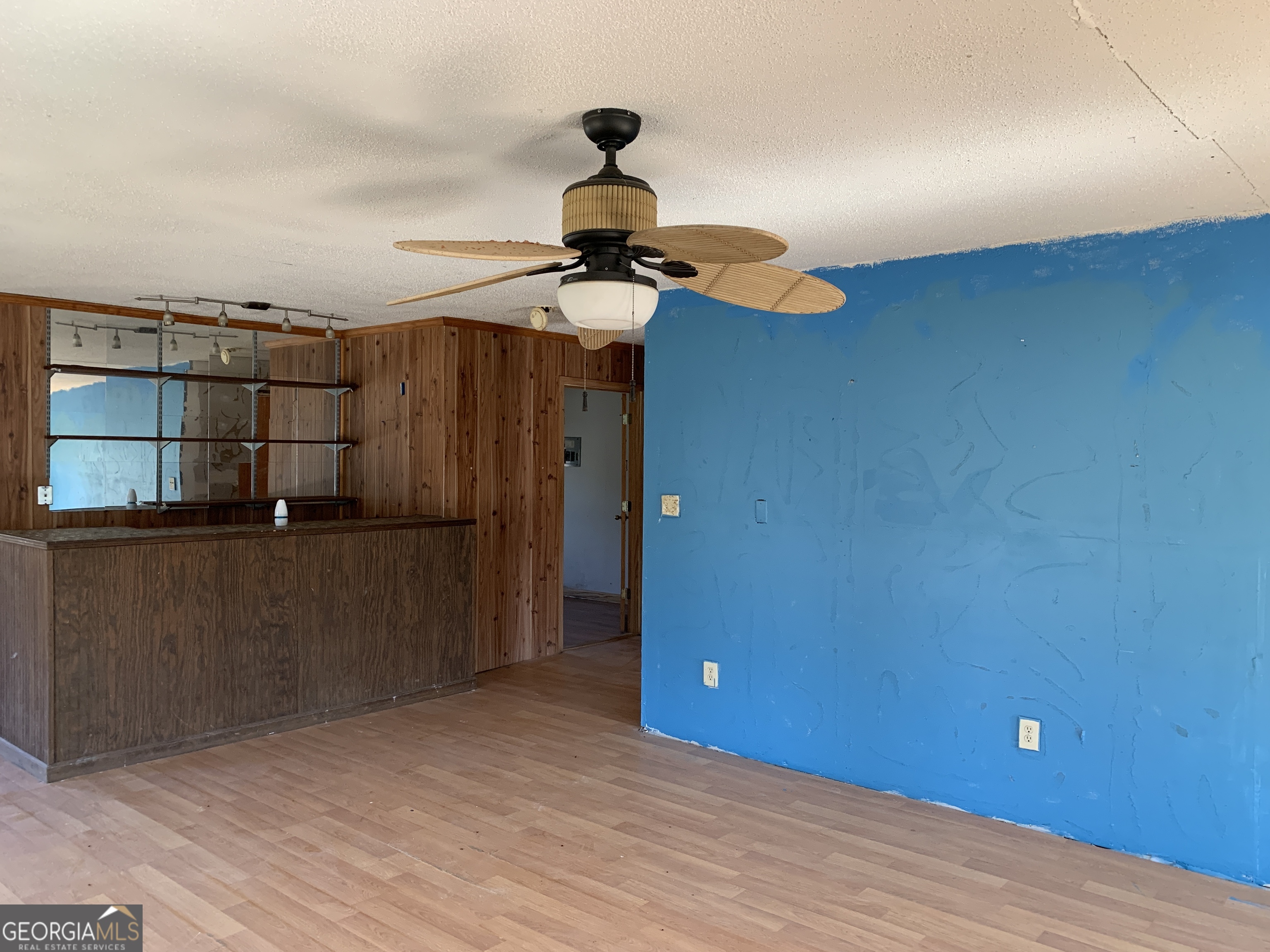 222 Reno Road Royston, GA 30662 - Photo 8 of 15 a view of a room with cabinet and wooden floor