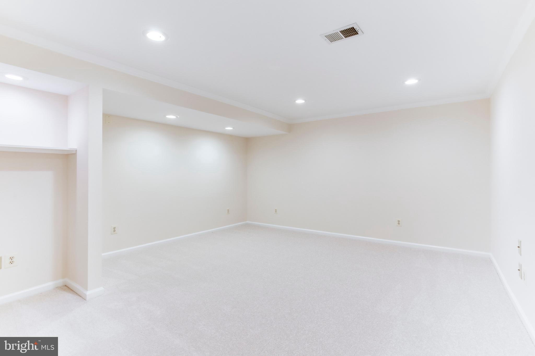 2093 Cobblestone Lane Reston, VA 20191 - Photo 30 of 43 Lower level recreation room w/recessed lights
