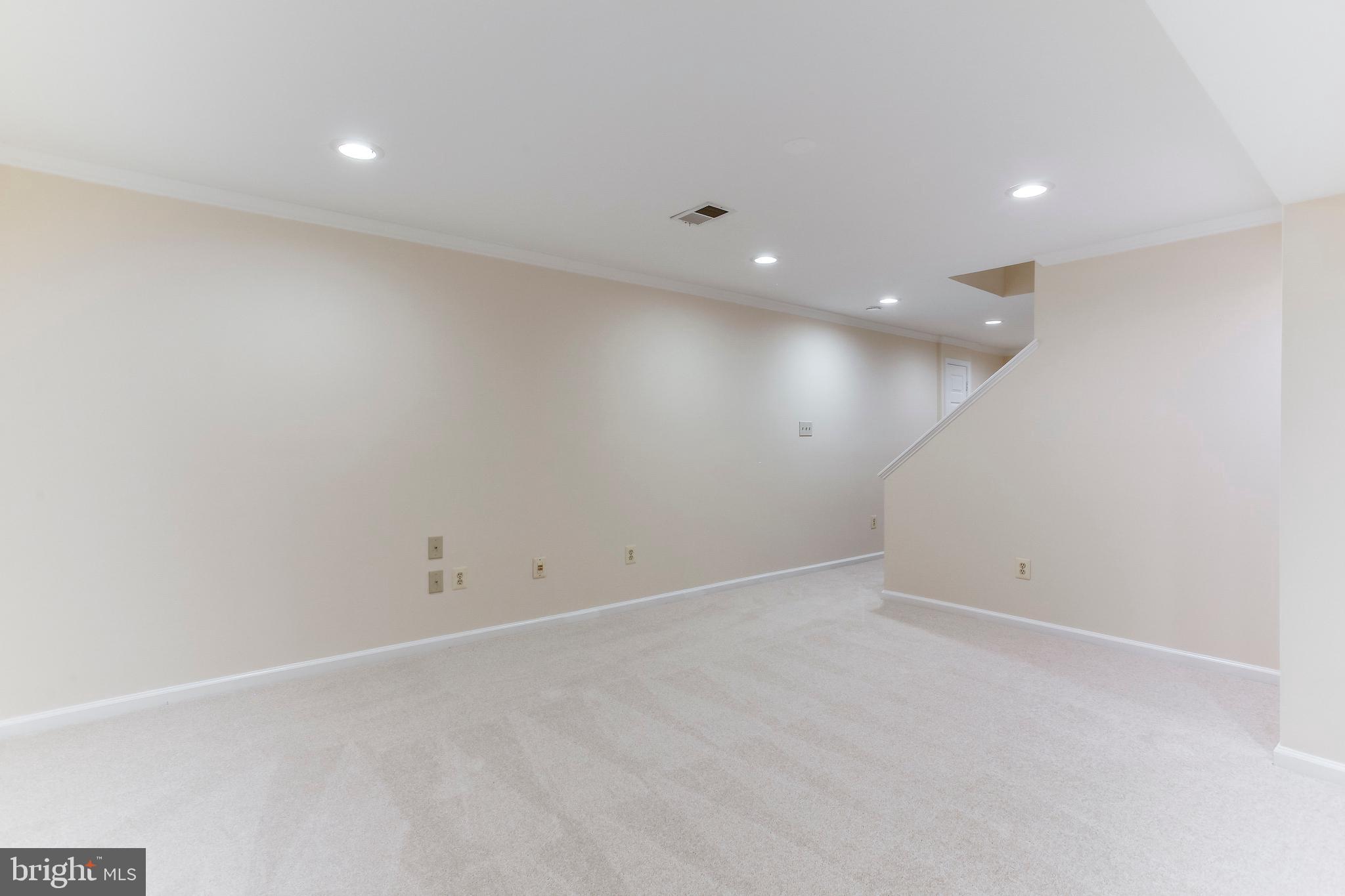 2093 Cobblestone Lane Reston, VA 20191 - Photo 31 of 43 Lower level large rec room area
