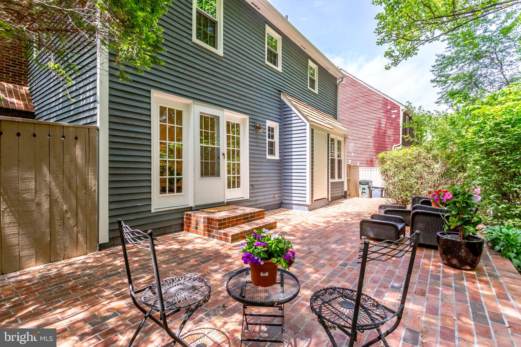 2093 Cobblestone Lane Reston, VA 20191 - Photo 38 of 43 Large brick patio with separate seated areas