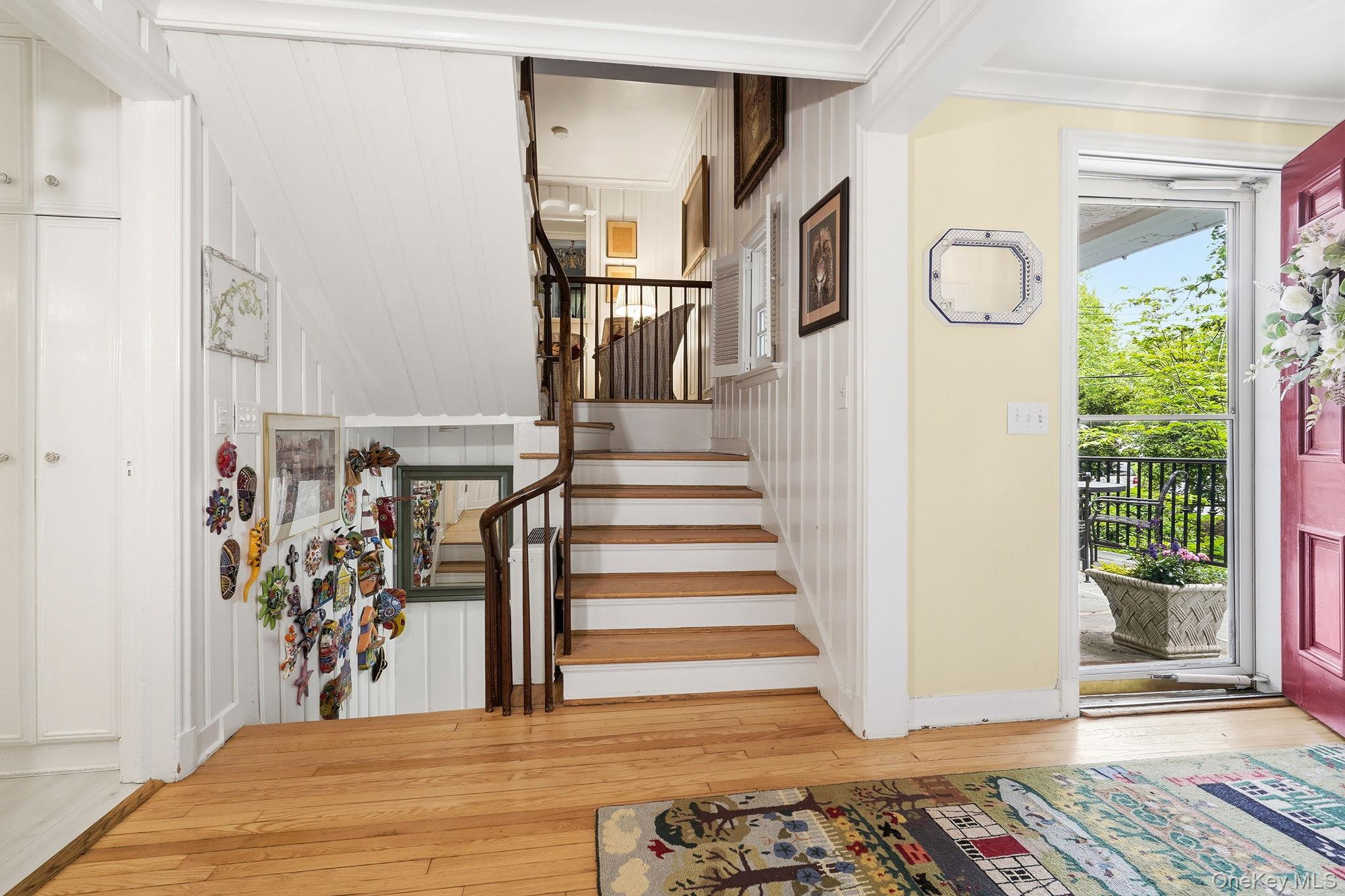 26 Cedarlawn Road Irvington, NY 10533 - Photo 4 of 34 a view of a hallway with wooden floor and entryway