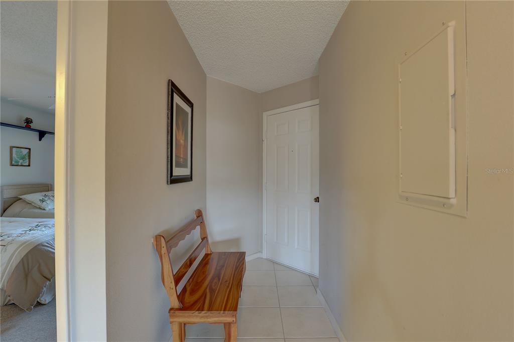 2131 Ridge Road South, Unit 132 Largo, FL 33778 - Photo 21 of 32 a view of a hallway with couch and closet