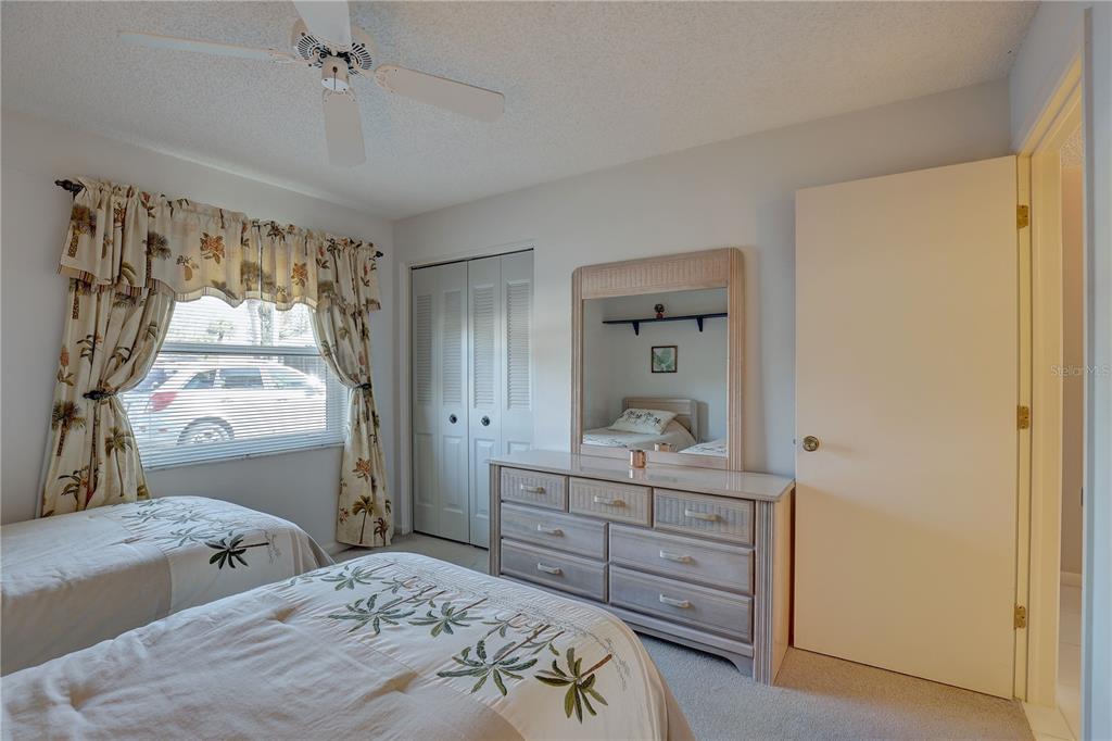 2131 Ridge Road South, Unit 132 Largo, FL 33778 - Photo 24 of 32 a bedroom with a bed and a window