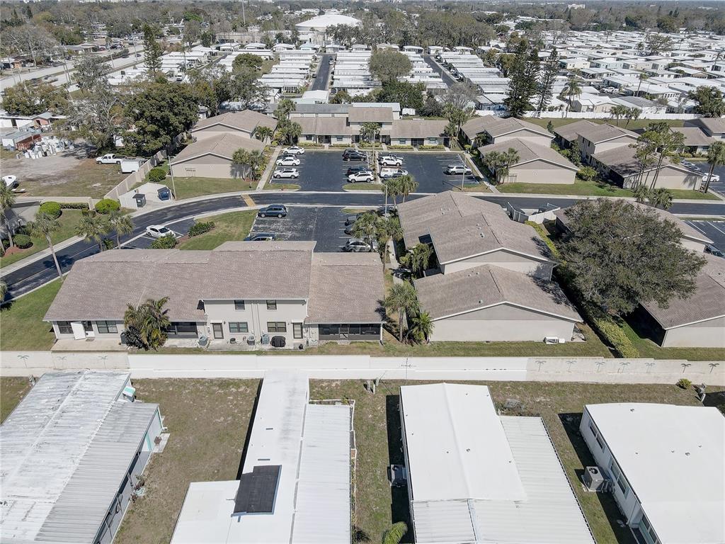 2131 Ridge Road South, Unit 132 Largo, FL 33778 - Photo 32 of 32 an aerial view of residential houses with outdoor space
