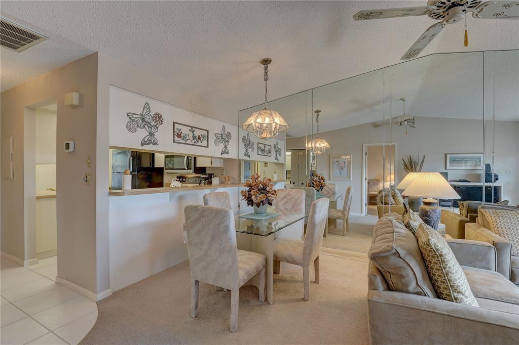 2131 Ridge Road South, Unit 132 Largo, FL 33778 - Photo 7 of 32 a view of a dining room with furniture
