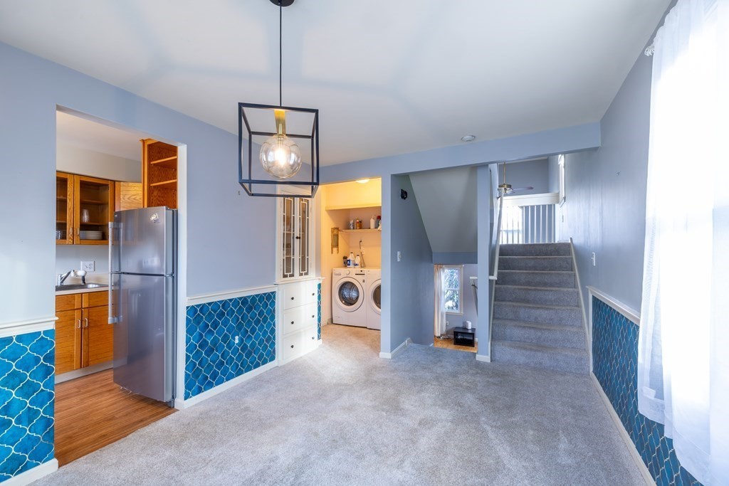 12 Pickett Street, Unit H Beverly, MA 01915 - Photo 10 of 31 a view interior of a house and chandelier
