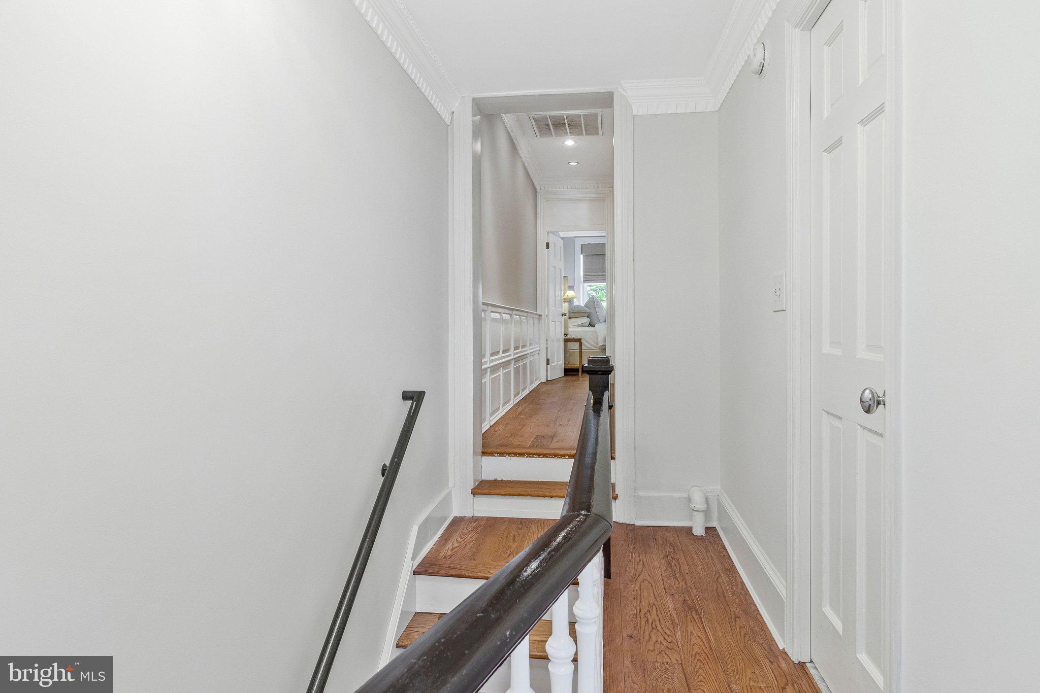 611 G Street Southeast Washington, DC 20003 - Photo 15 of 32 a view of a hallway with staircase