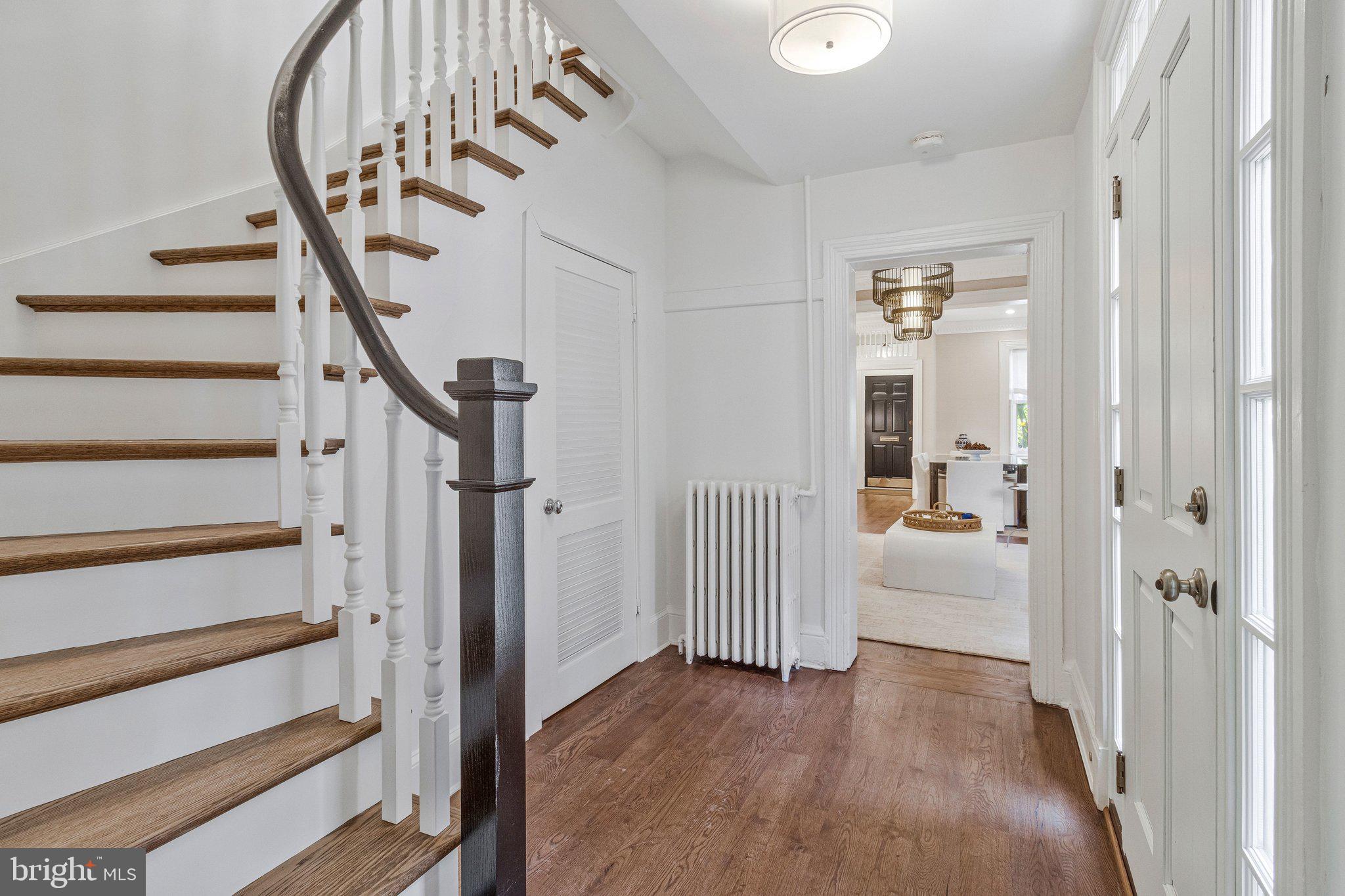 611 G Street Southeast Washington, DC 20003 - Photo 7 of 32 a view of a hallway with wooden floor and entryway