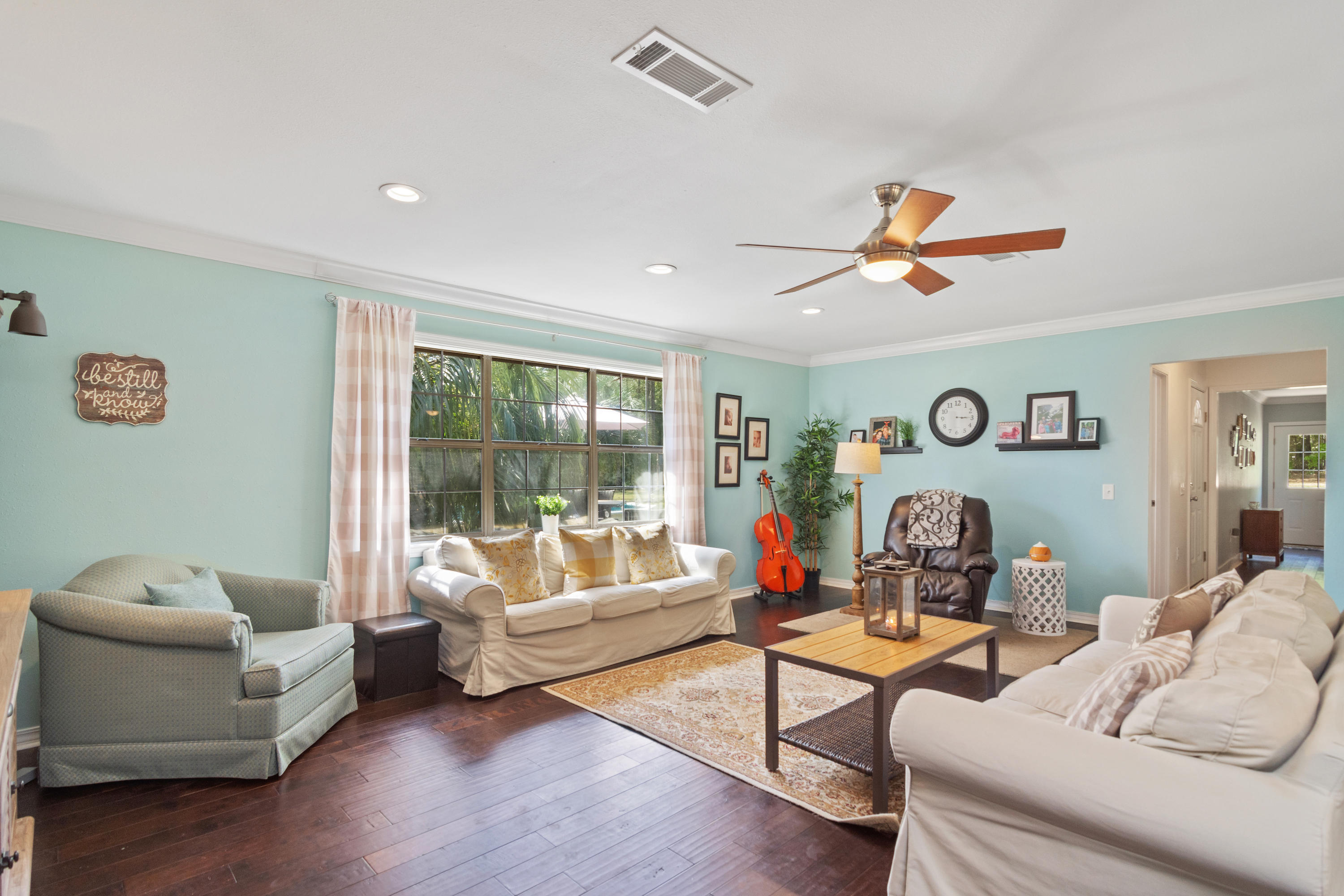 658 Ridge Lake Road Crestview, FL 32536 - Photo 15 of 47 a living room with furniture and a large window
