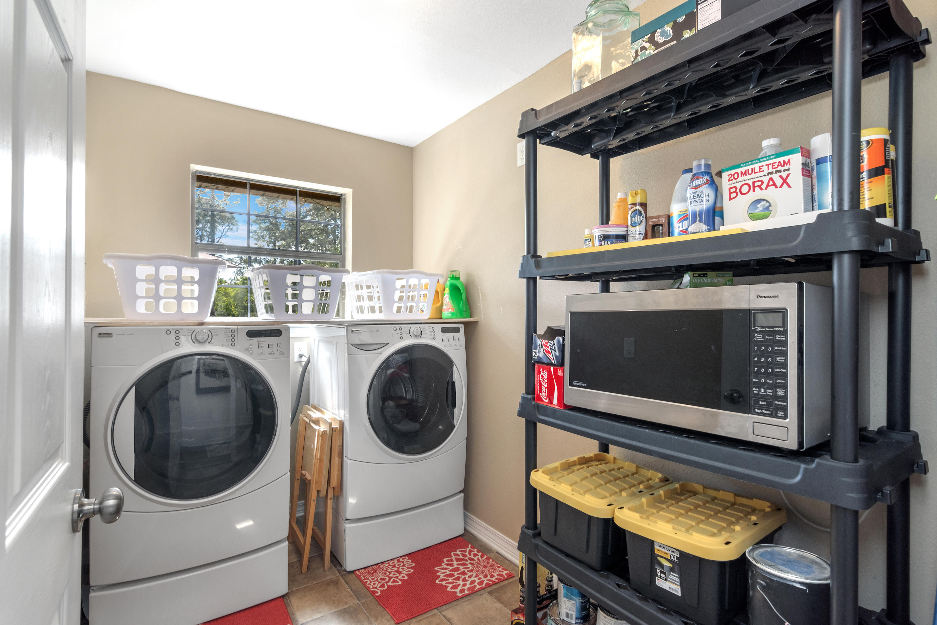 658 Ridge Lake Road Crestview, FL 32536 - Photo 17 of 47 a utility room with dryer and washer
