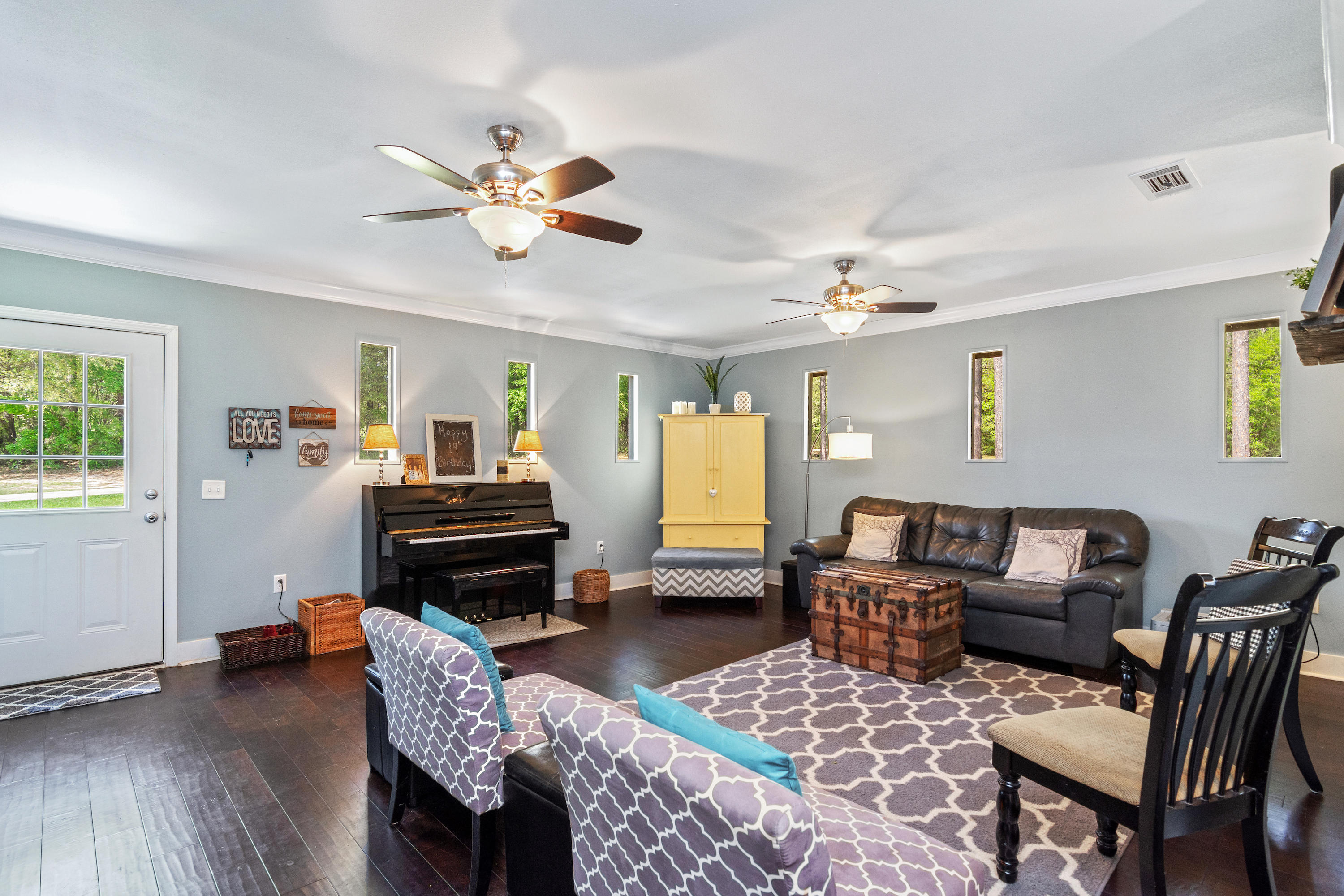 658 Ridge Lake Road Crestview, FL 32536 - Photo 18 of 47 a living room with furniture and wooden floor