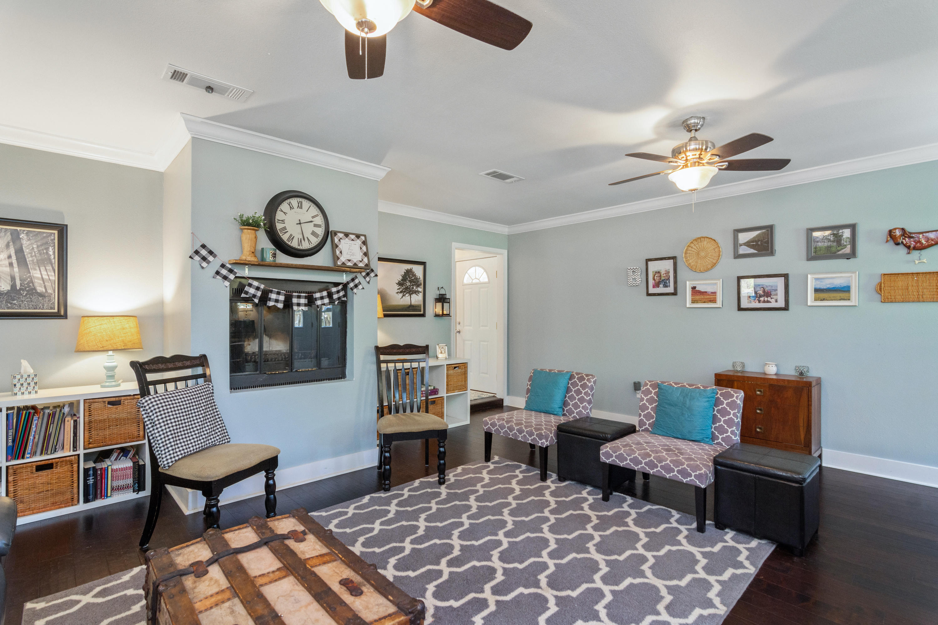 658 Ridge Lake Road Crestview, FL 32536 - Photo 20 of 47 a very nice looking living room with furniture and paintings on the wall