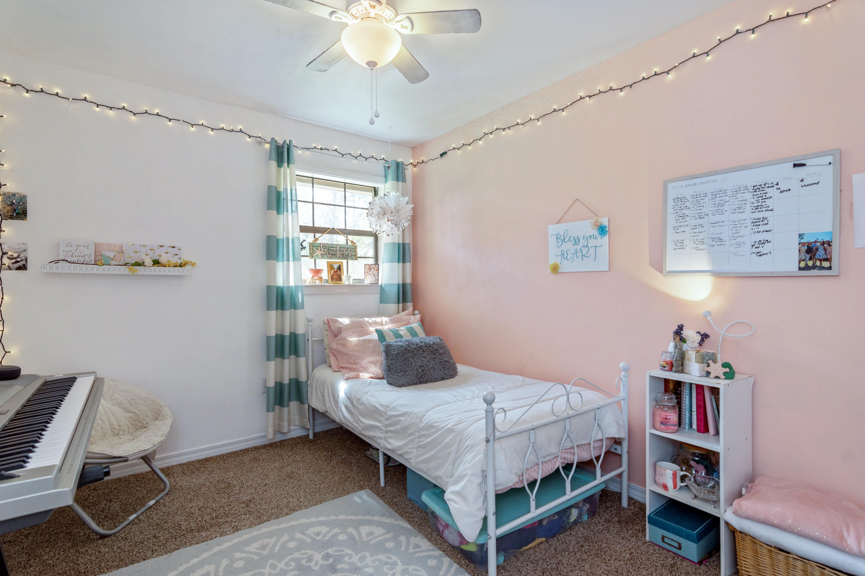658 Ridge Lake Road Crestview, FL 32536 - Photo 27 of 47 a bedroom with a bed workspace and a window