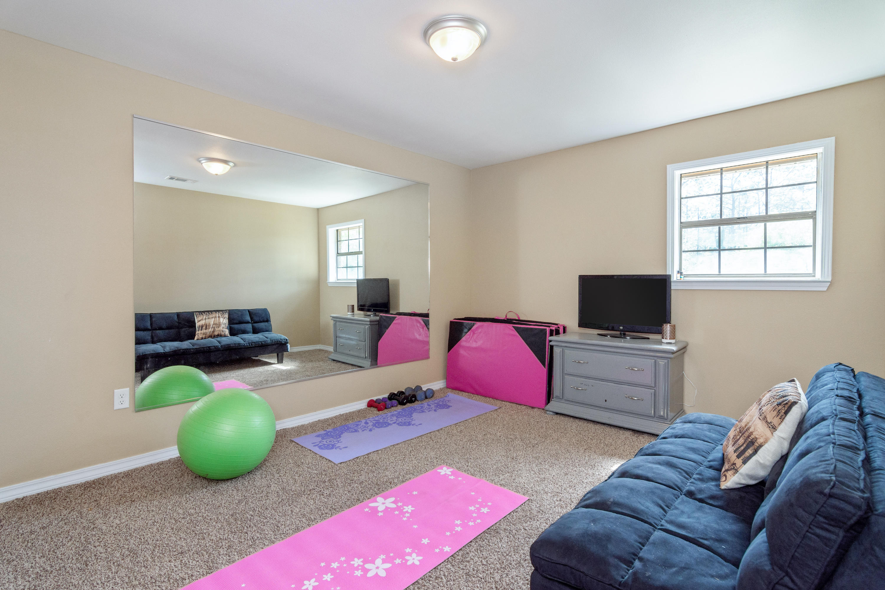 658 Ridge Lake Road Crestview, FL 32536 - Photo 28 of 47 a bedroom with a bed and a television