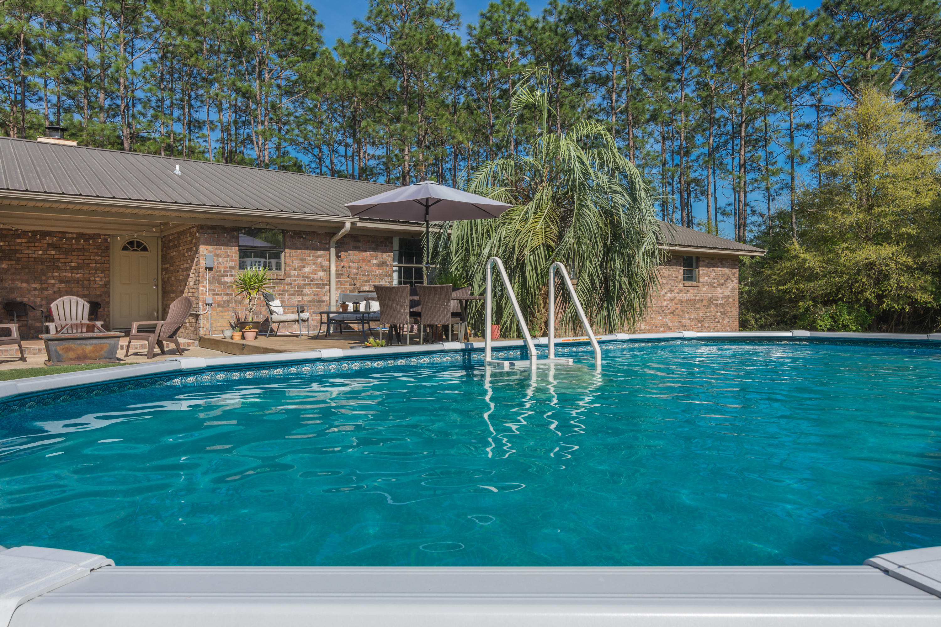 658 Ridge Lake Road Crestview, FL 32536 - Photo 39 of 47 a view of a house with backyard