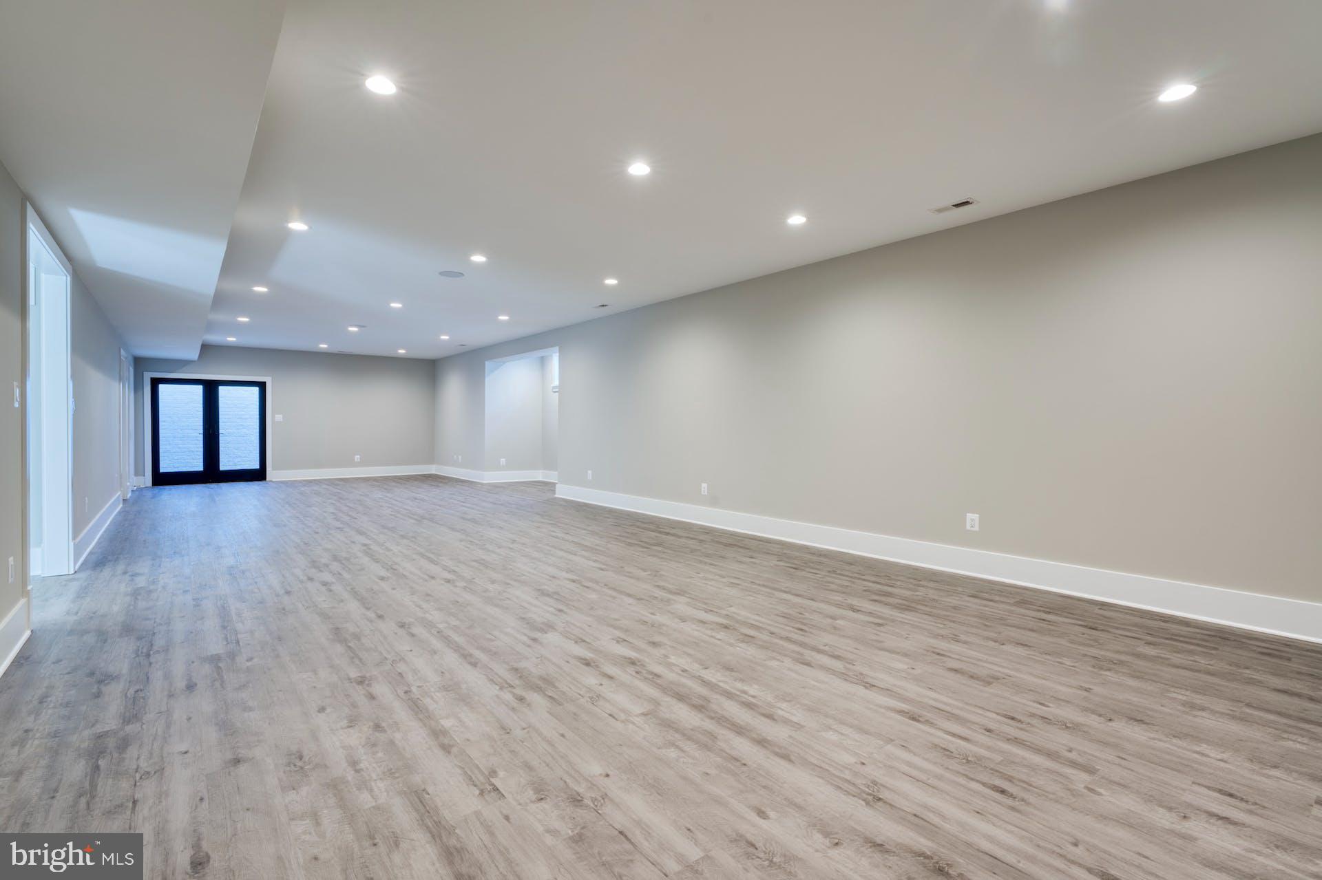 1623 Dempsey Street McLean, VA 22101 - Photo 45 of 54 Large basement rec room with walk-up stairs