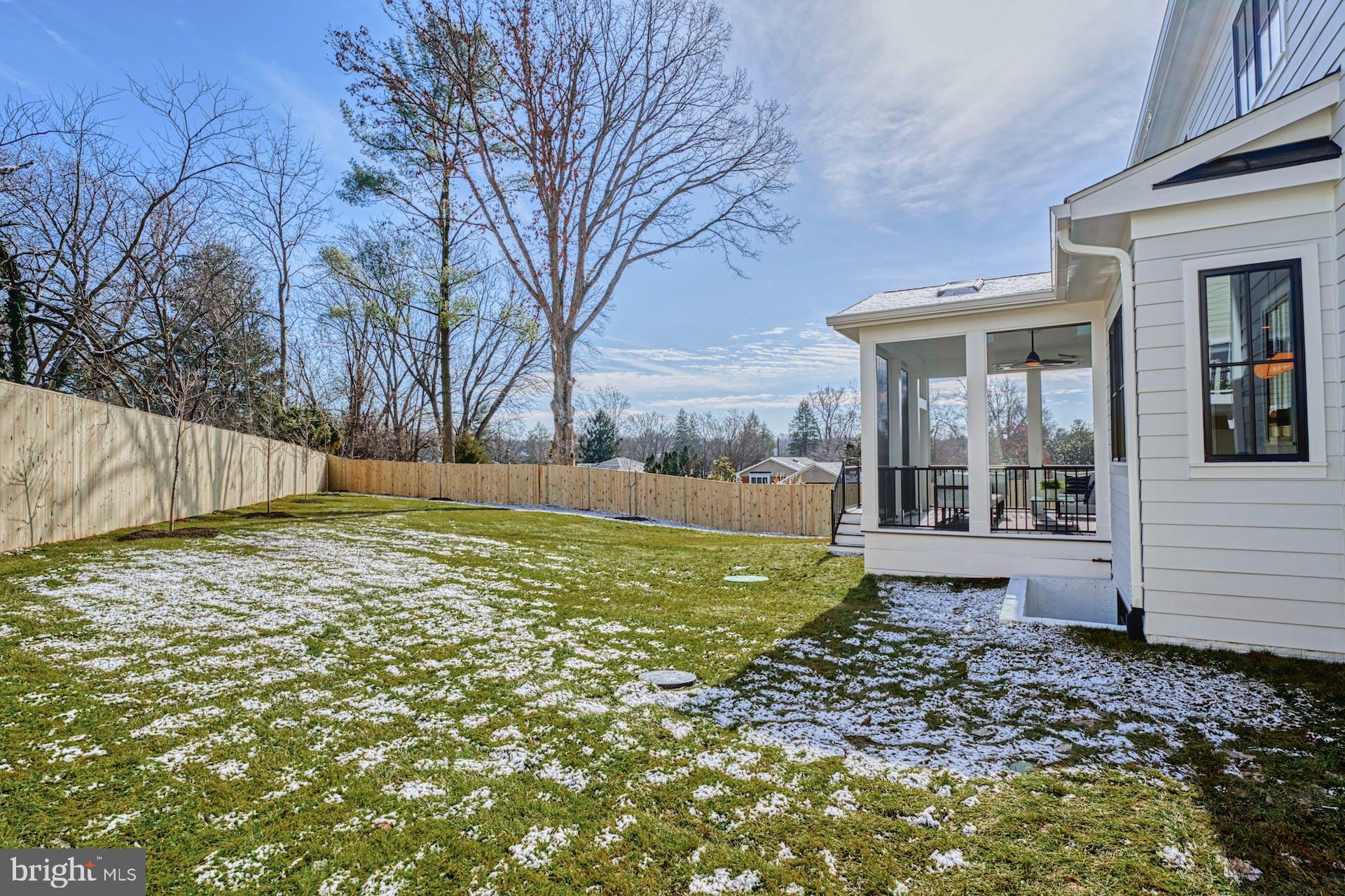 1623 Dempsey Street McLean, VA 22101 - Photo 51 of 54 Wood fence around the back yard with two gates.