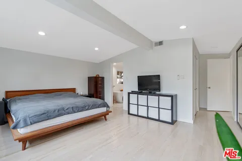 a bathroom with a bathtub and a sink