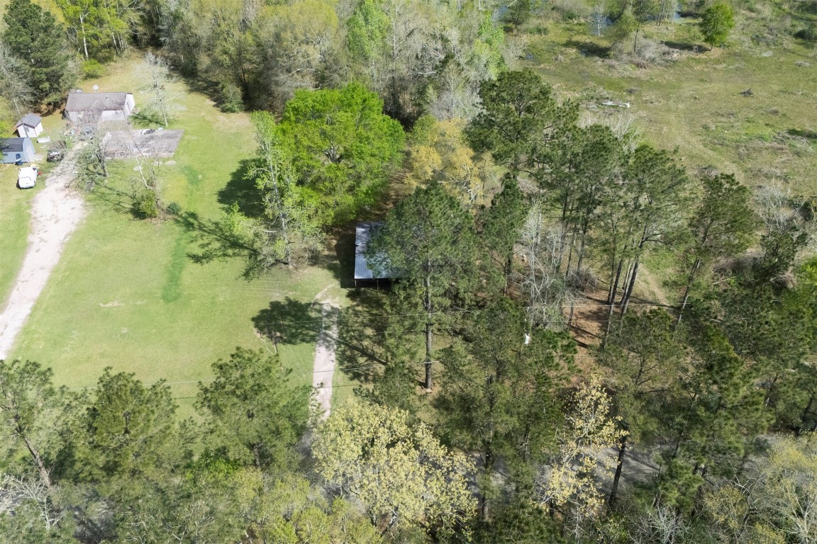 801 Campbell Acres Road Cleveland, TX 77328 - Photo 32 of 36 a view of a lake view