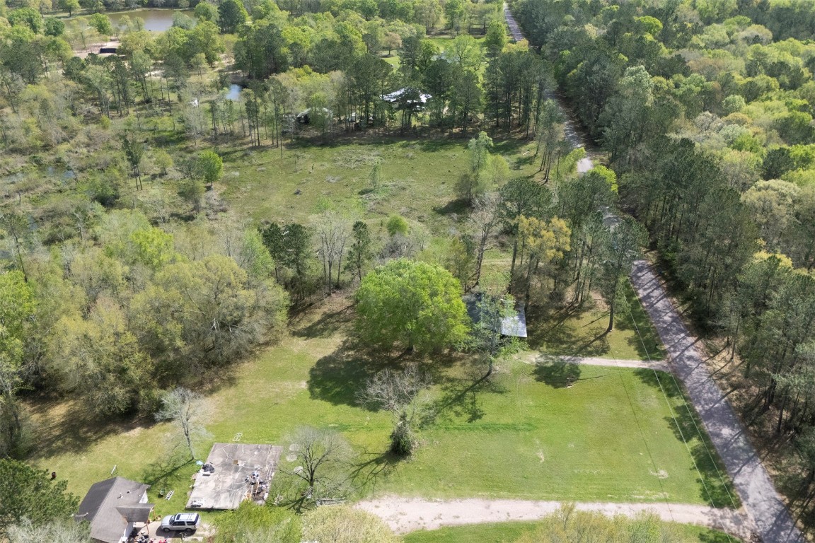 801 Campbell Acres Road Cleveland, TX 77328 - Photo 35 of 36 a view of a garden