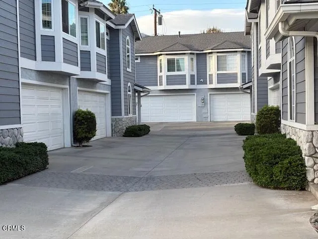 a view of a building with backyard