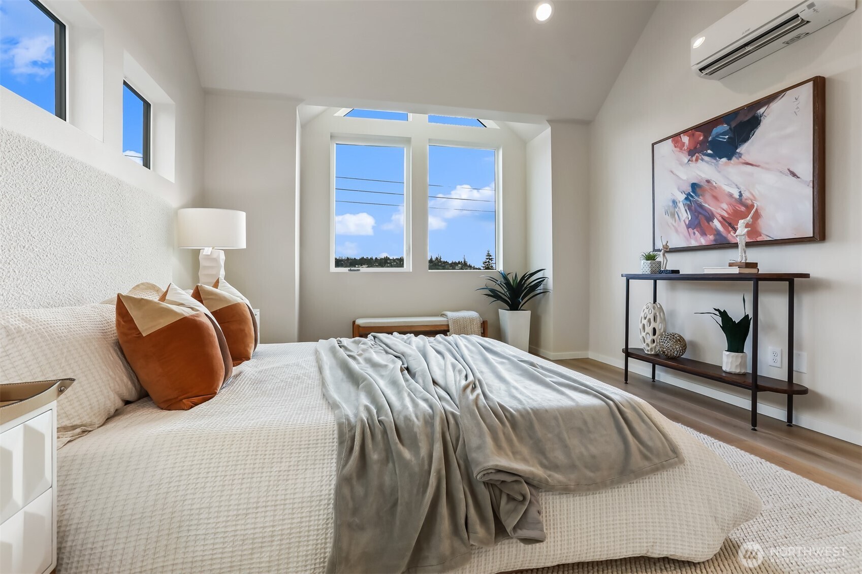 836 Northwest 50th Street Seattle, WA 98107 - Photo 17 of 35 a bedroom with a bed and a painting on the wall
