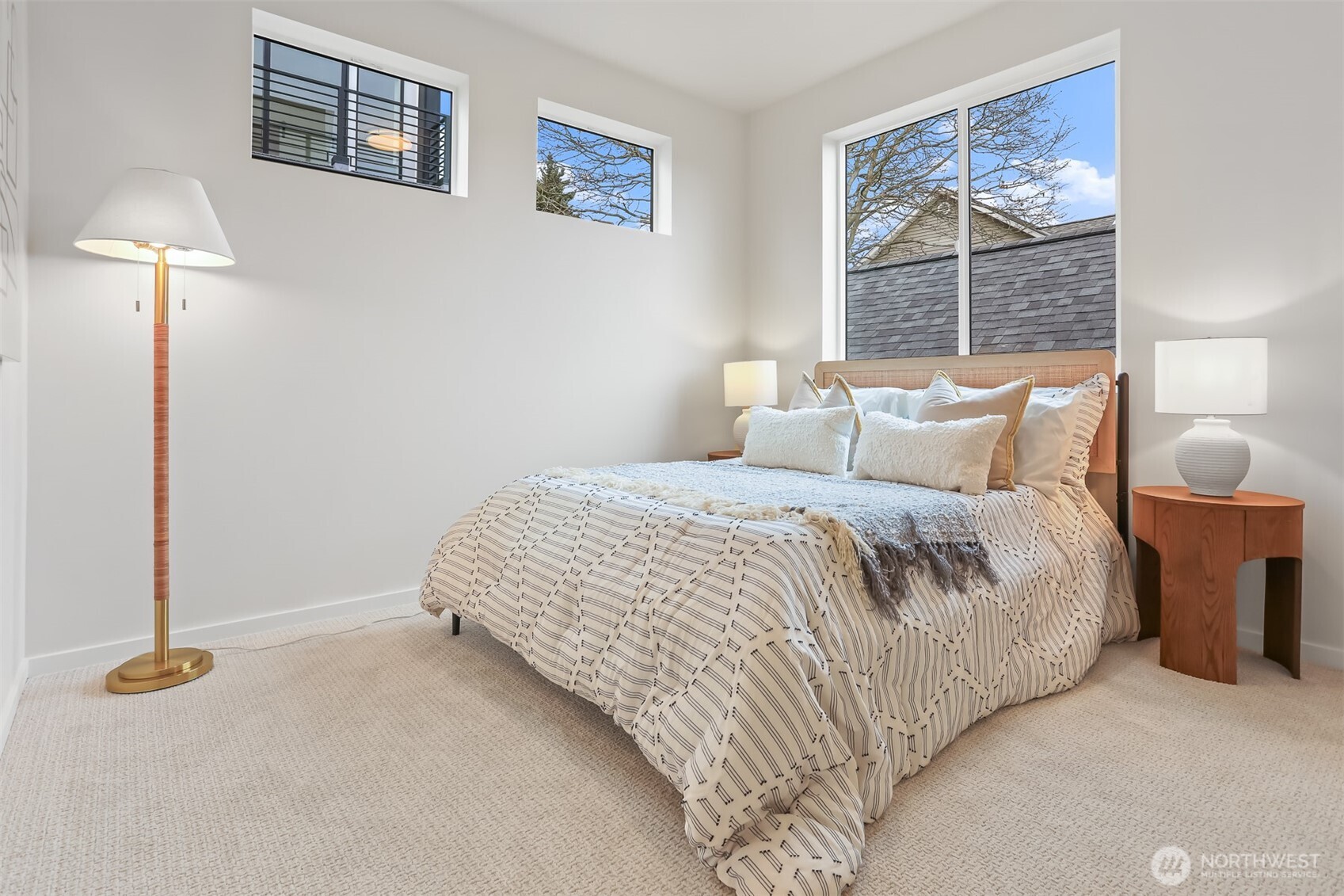 836 Northwest 50th Street Seattle, WA 98107 - Photo 22 of 35 a bedroom with a bed and a window