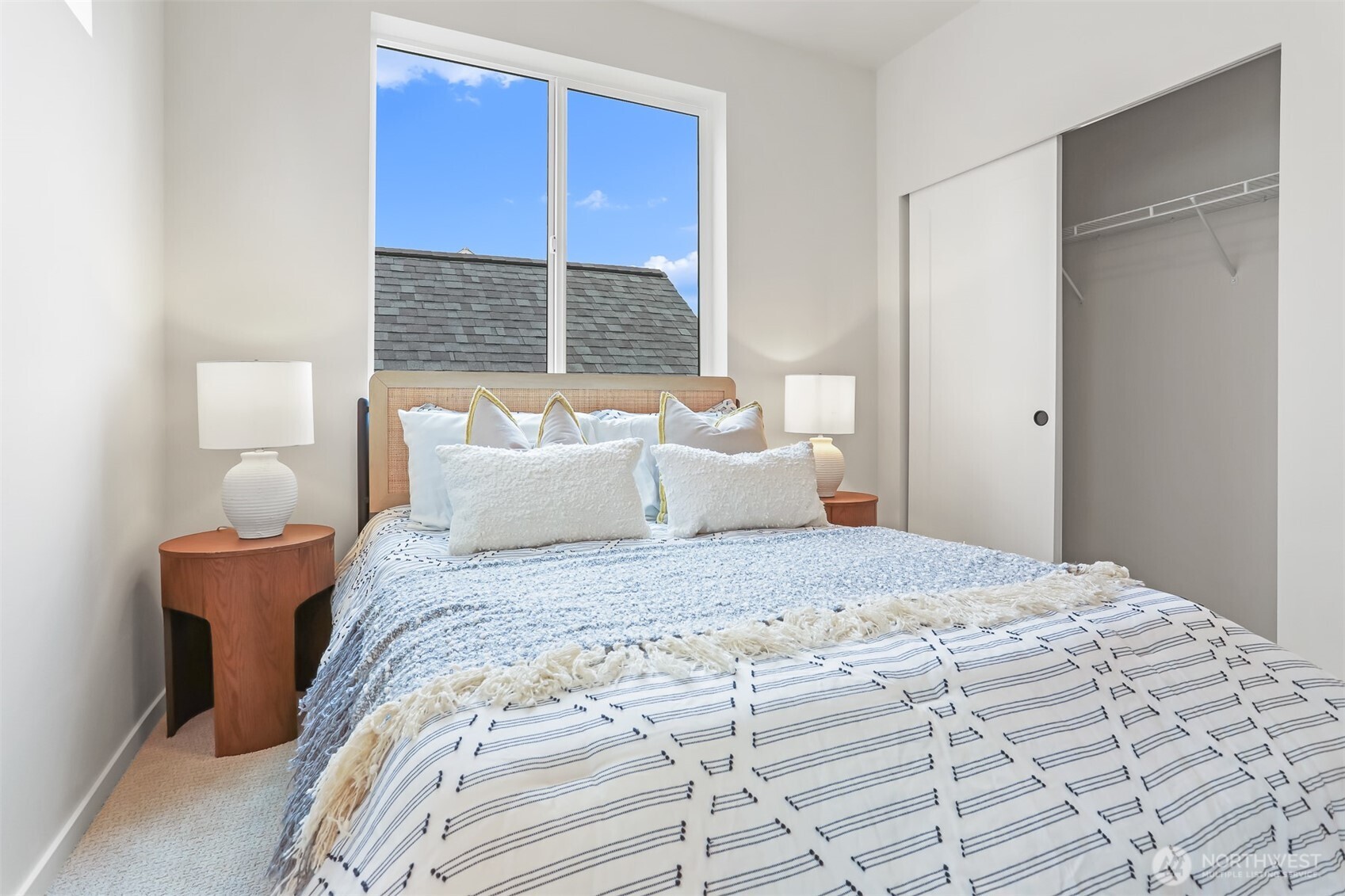 836 Northwest 50th Street Seattle, WA 98107 - Photo 23 of 35 a bedroom with a bed and a window
