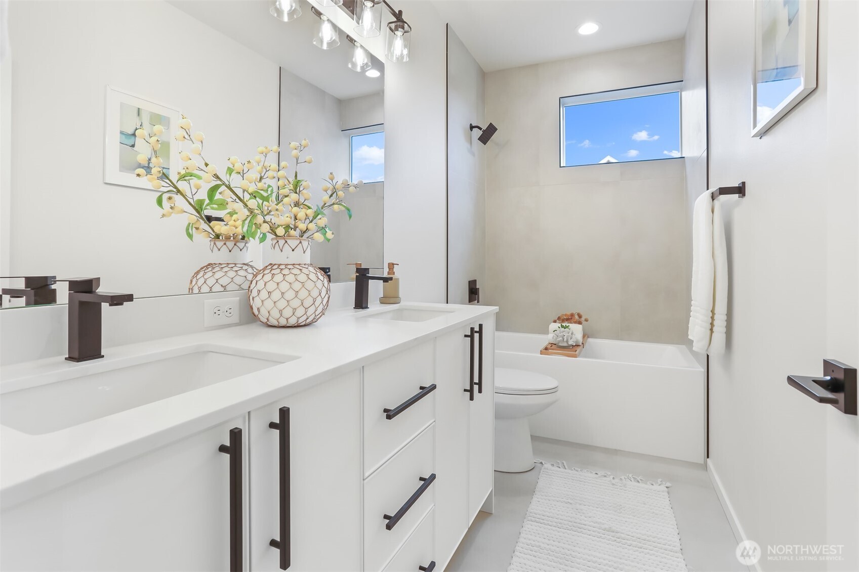836 Northwest 50th Street Seattle, WA 98107 - Photo 26 of 35 a bathroom with a granite countertop sink a toilet and a mirror