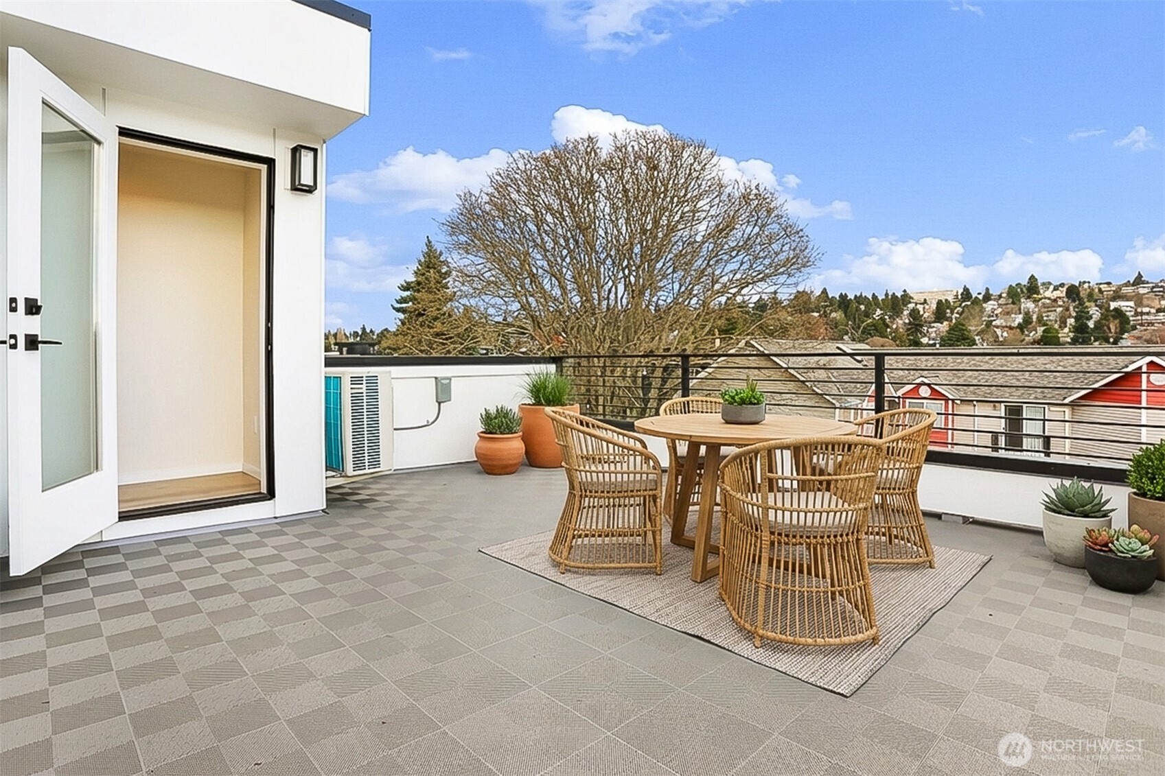 836 Northwest 50th Street Seattle, WA 98107 - Photo 32 of 35 a view of a terrace with furniture and city view