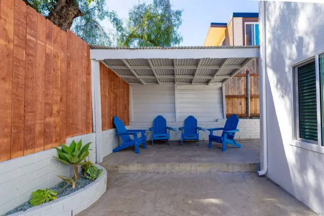 a view of a chairs in patio