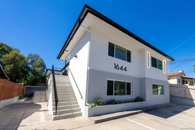 a front view of a house with garage
