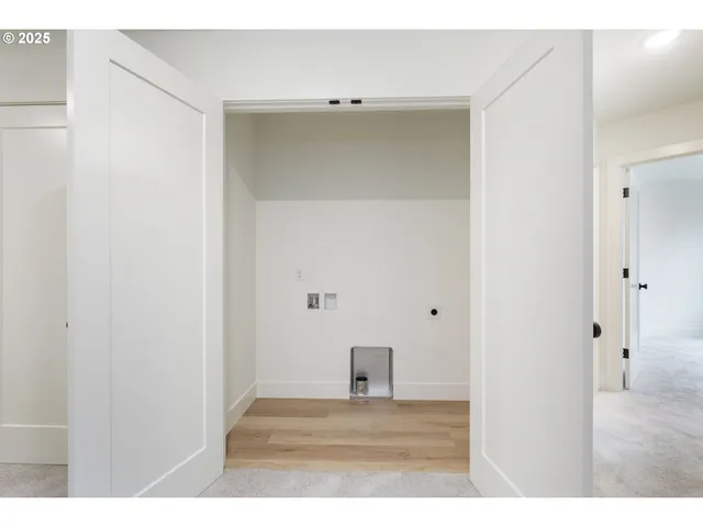 a view of a yard with a large tree