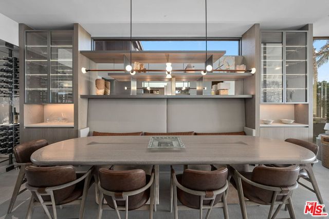 a kitchen with a stove and a refrigerator