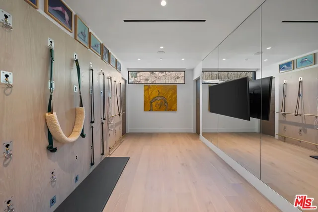 a bathroom with a sink double vanity and a mirror