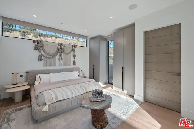 a swimming pool with outdoor seating and yard