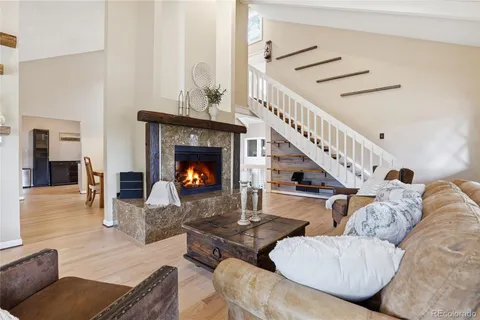 a view of balcony with wooden floor and fence